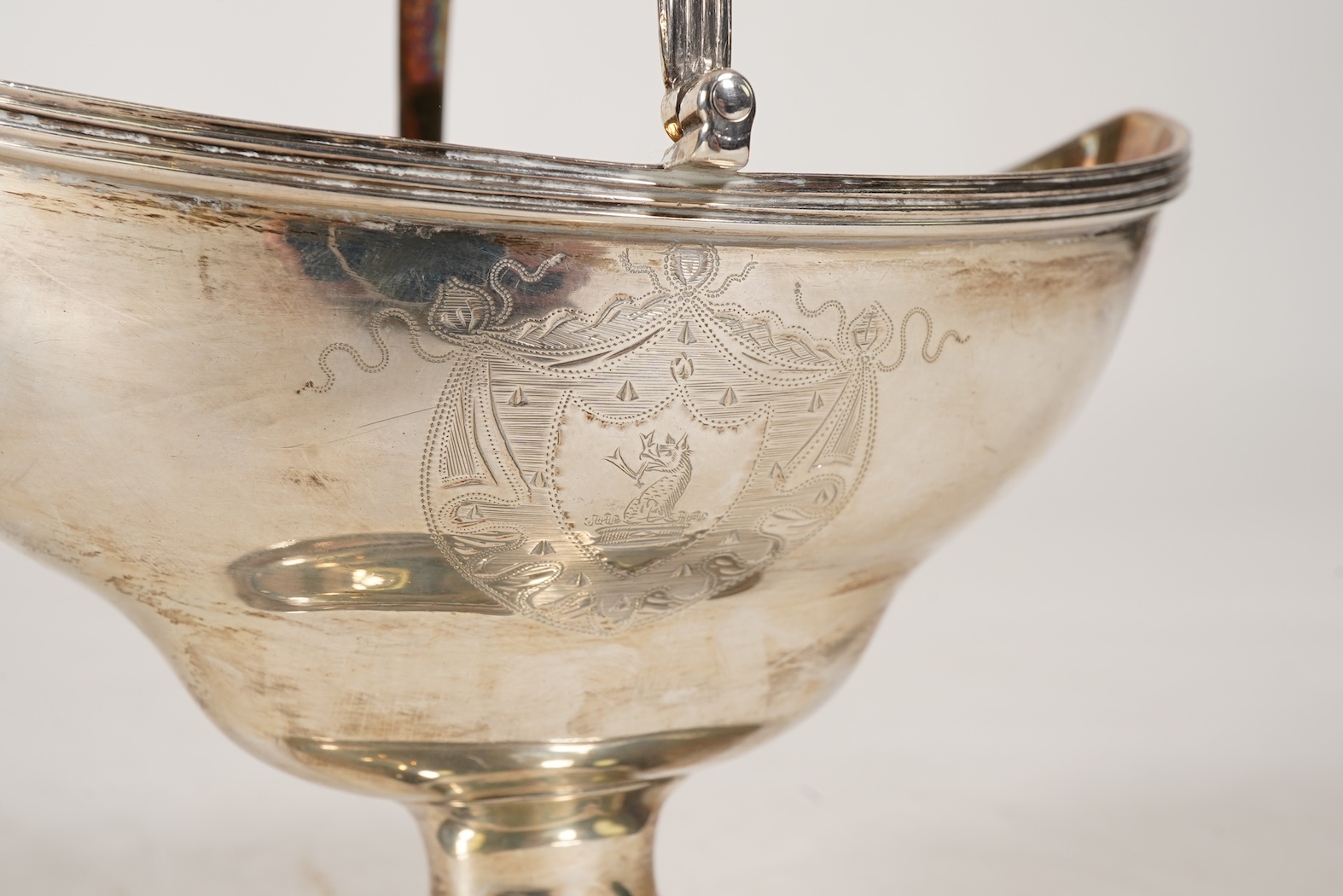 A George III silver boat shaped pedestal sugar basket, by Peter & Ann Bateman